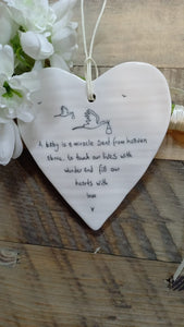 "A baby is a miracle sent from heaven above..." Ceramic Hanging Heart